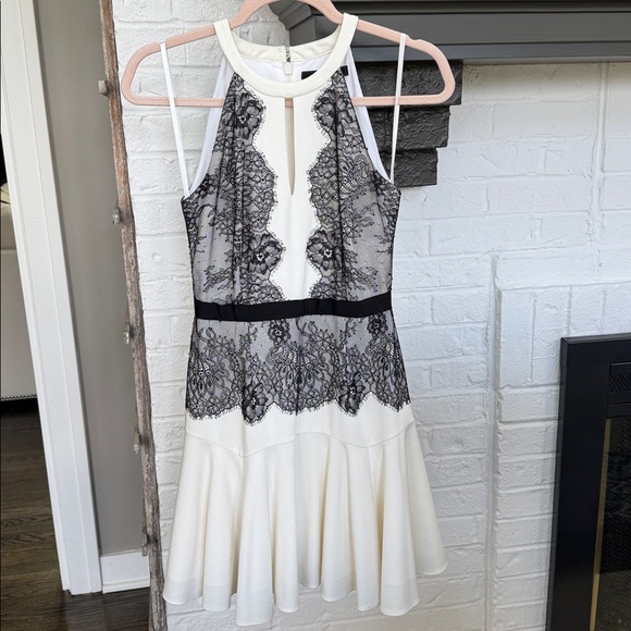 BCBGMaxAzria Dresses & Skirts - BCBGMaxAzria Ivory Dress with Black Lace Overlay